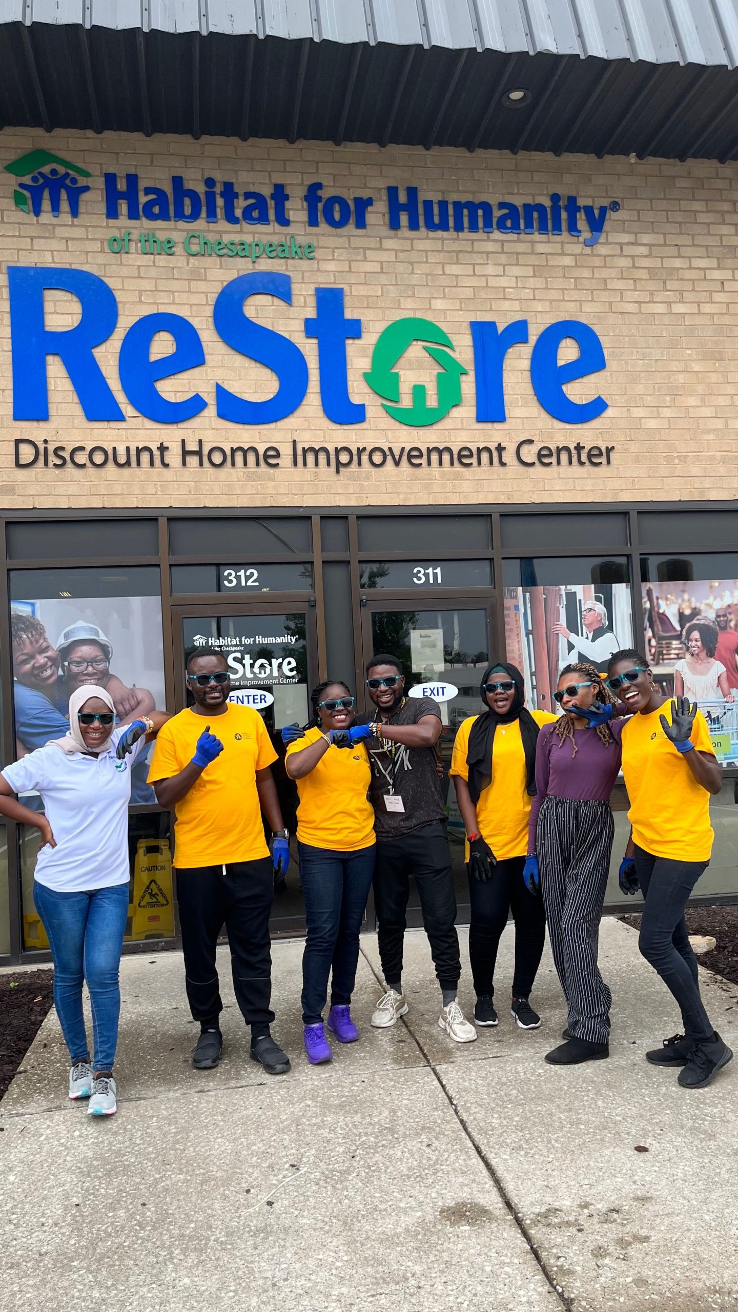 group of ReStore volunteers outside of the store